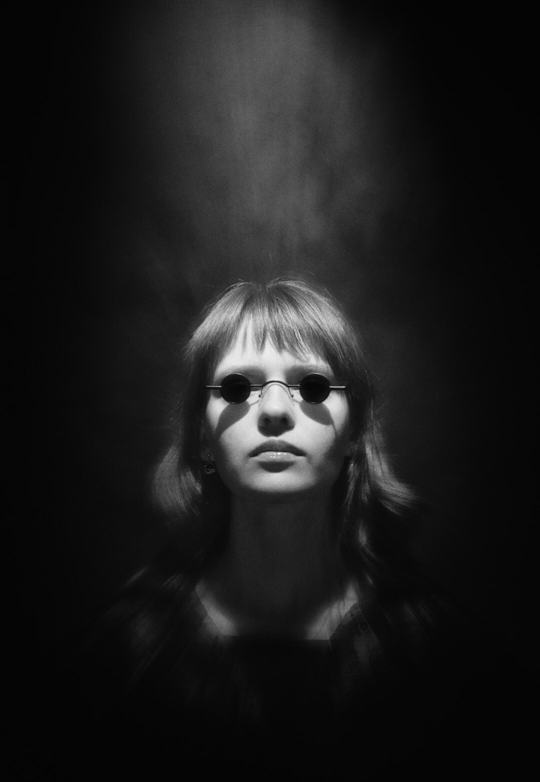 Finnish woman with glasses studio portrait