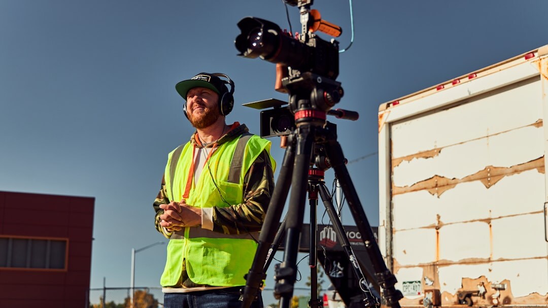Technician monitoring live broadcast signal feeds