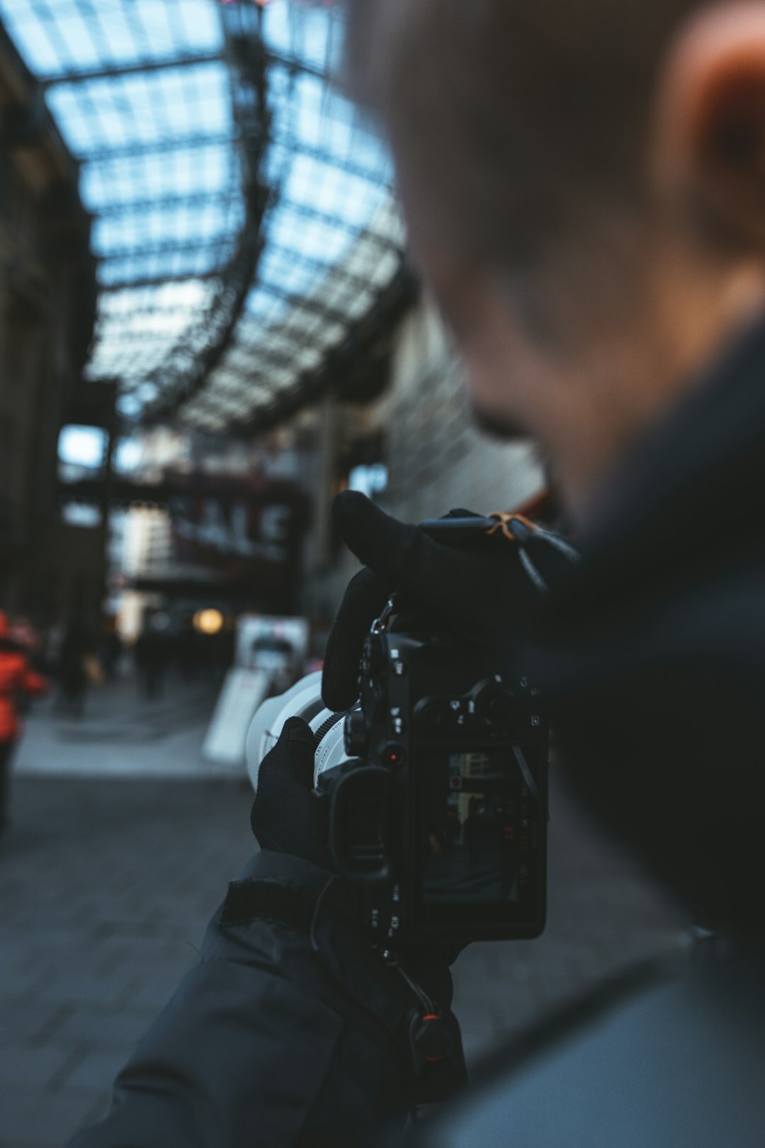 Camera operator filming a live news segment