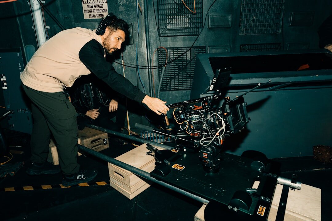 Broadcast studio technicians reviewing equipment setup